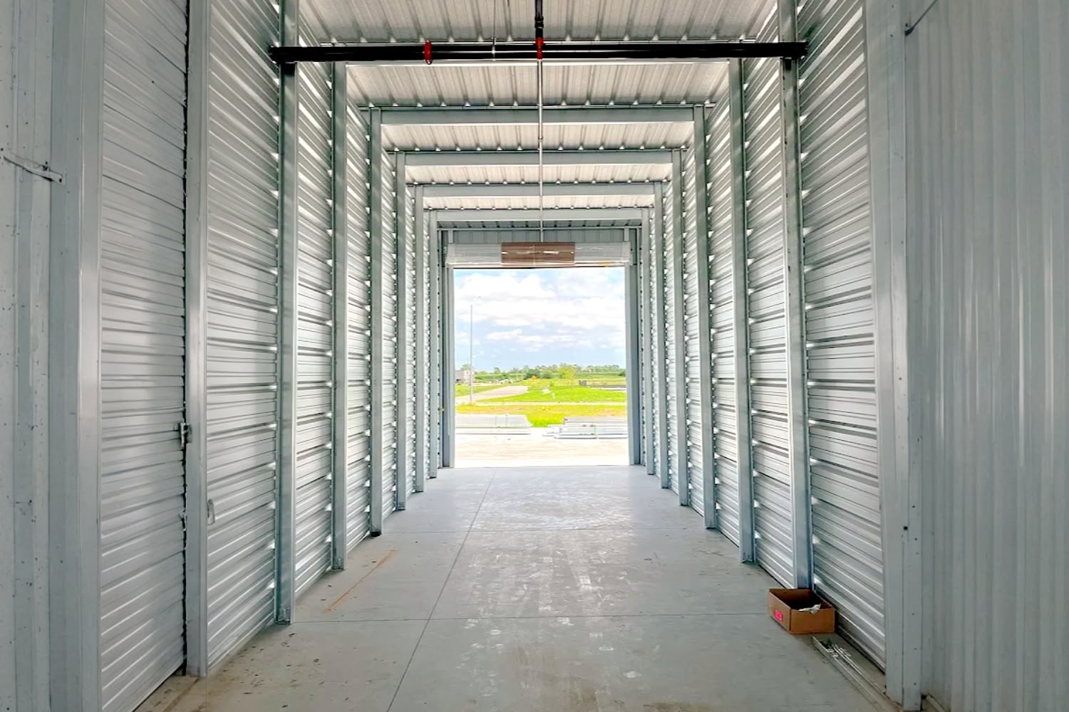 Inside a clean, well-lit storage unit at XL Storage Co in Waukee, IA